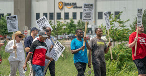 Why Thousands Of Amazon Workers Are Striking On Prime Day