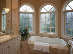 Depending on what’s outside, you might not be able to treat master bath windows like any old window