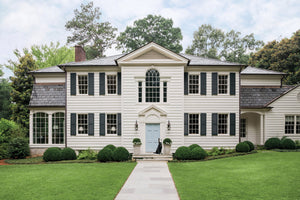 This traditional New England–style country home, designed by famed Southern architect Lewis Crook, was built in the 1930s