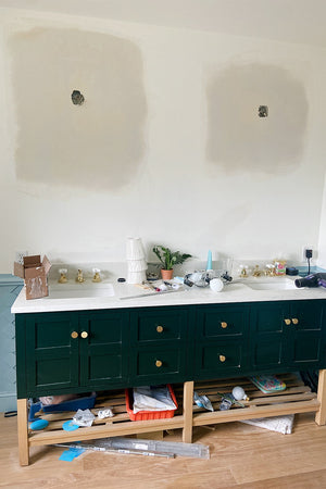 Geometric Wainscoting and Floral Wallpaper Amp Up a Previously Boring Bathroom